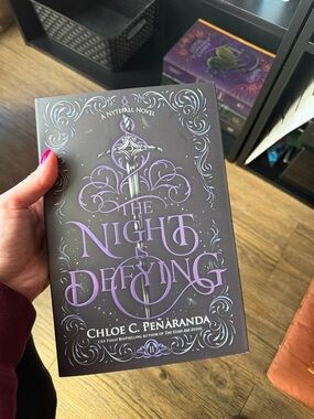 The Night Is Defying by Chloe C. Peñaranda - sprayed edges Hardcover